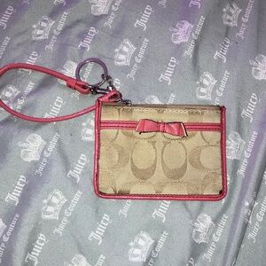 Coach Tan and Pink Wristlet with Bow Accent